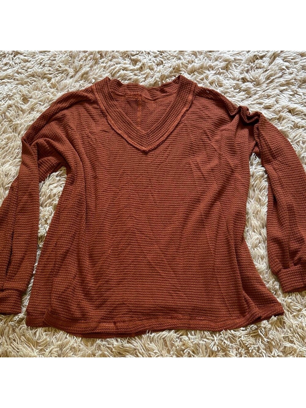 Brown rust waffle knit polyester & spandex long sleeve top in a S